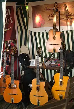 Maccaferri guitars have D or Oval shaped sound holes.