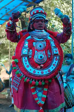 Gulikan Theyyam at Puthiya Mundayat