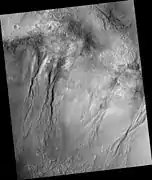Group of gullies in Thaumasia quadrangle, as seen by HiRISE under the HiWish program.