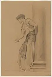 Youth leaning against pillar