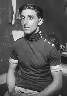 Seated man in cycling uniform