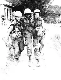 PFC Mauro, PFC Carter, and SP4 Widmer (Carter shot himself in the foot with a .45 pistol during the My Lai Massacre.)