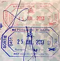 Entry and exit stamps from Toussaint Louverture International Airport, Port-au-Prince.