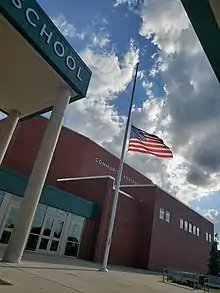 American flag flying half-staff after Elizabeth II's death.