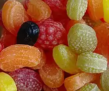 Fruit-shaped hard candy is a common type of sugar candy, containing sugar, color, flavor, and a tiny bit of water.