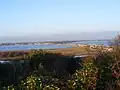 Sand bar at end of Christchurch Harbour, viewed from Hengistbury Head