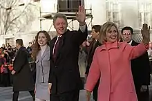 Chelsea, Bill, and Hillary Clinton take an inauguration day walk down Pennsylvania Avenue in Washington, D.C., on January 20, 1997, when Bill started a second term as president.