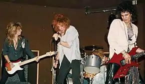 Hollywood Rose playing Madame Wong's East on June 28, 1984. From left to right, bassist Steve Darrow, singer Axl Rose, drummer Steven Adler, and guitarist Slash