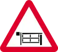 Level crossing with barrier ahead