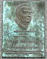 A plaque in Poznań honoring Hoover