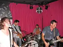 Left to right: Froberg, Wood, Kourkounis, and Reis in 2011