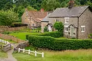 Dwellings on the village green and beck