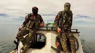 IRPGF fighters crossing the Lake Assad by boat