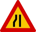 Road narrows on left hand side