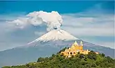 Iglesia de Nuestra Señora de los Remedios with the volcano in the background