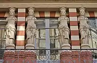 White terracotta caryatids on the Virebent Factory, Toulouse, France, 1830s