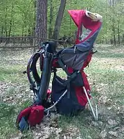 Hard-framed backpack baby carrier