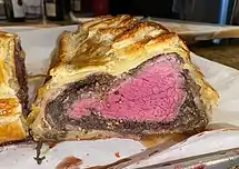Inside of a medium-rare Beef Wellington