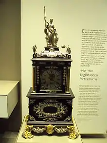 Room 39 – Ornate clock made by Thomas Tompion, England, 1690 AD