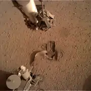 The mole, after being covered with sand by the robotic scoop