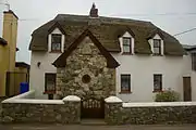 Thatched roof house in Kilmore Quay, Ireland