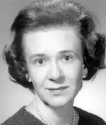 A white woman with dark hair