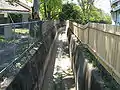 A narrow Iron Cove Creek at the end of Gregory St, Croydon.
