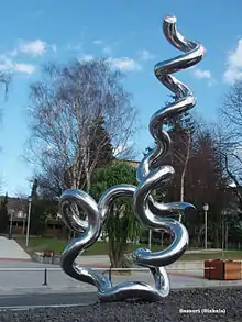 A curling metal tube.