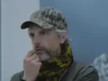 A white man with a hat