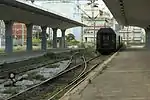 The through cars waiting on the 'dead-end' in front of the buffer stop, they are supposed to go with the night train 600 from Athens to Alexandrúpoli as far as Strymonas, June 2016.