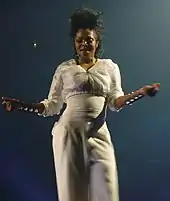 Picture of an African American woman dressed in white.