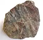 Dull red jasper veined with white quartz, rough, provenance : uncertain - possibly Crimea or Kyrgyzstan