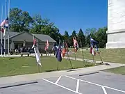 Confederate flags displayed by monument