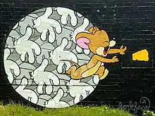 Mural by Jerkface of Jerry the mouse in Little Five Points Atlanta