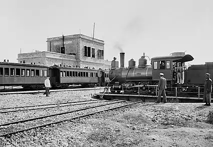 Image 6The Jerusalem Railway Station c. 1900. The locomotive on the turntable is "Ramleh" (J&J No. 3), a Baldwin 2-6-0. The station was the terminus of the Jaffa–Jerusalem railway until its closure in 1998. Today, the station is abandoned and suffering from neglect and vandalism, although it is one of 110 buildings selected for preservation in Jerusalem.