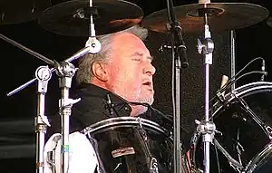 Black performing with the Stranglers at the 2006 Bestival