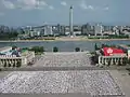 The Kim Il Sung Square and the Tower of Juche Idea seen from the Grand People's Study House.