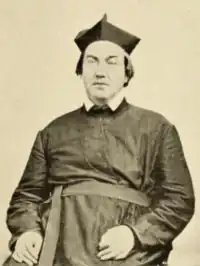 Early sitting still, eyes slightly closed