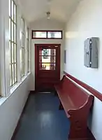 The enclosed passenger area, with bench.