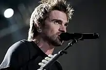 Juanes performing in 2015