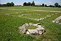 La Boissière, with a ruined well in the foreground, La Tonnelle house on the site of the forum (rear)