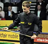 Judd Trump waiting to take a shot