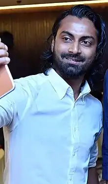 Jumayyil taking a selfie with president