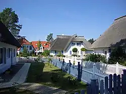 Houses with typical thatched roofs in Karlshagen (Reed houses)