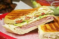 Image 9A Cuban sandwich is a variation of a ham and cheese sandwich that originated among the Cuban workers in the cigar factories in Key West, Florida