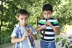 6 Armenian boys play recorders