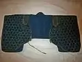 Japanese (samurai) Edo period kikko manchira. an armoured vest "manchira" with small hexagon iron plates "kikko" hidden between layers of cloth.