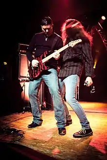Carroll and Bennett performing in 2013.