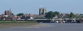 Kings Lynn, best known for both King's Lynn Minster and a statue to George Vancouver. The town is the administrative centre and largest settlement in the borough.