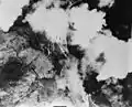 Aerial photo of a U.S. Army Air Forces bombardment on Kiska island, Alaska, in 1942.